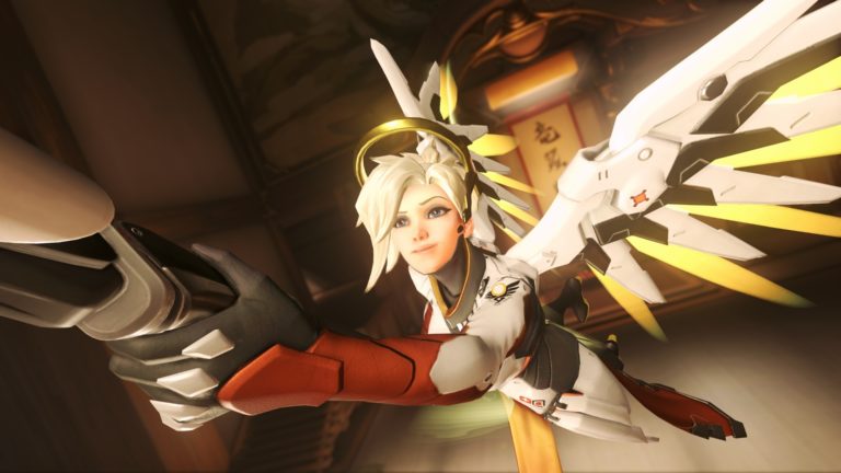 Brave Mercy blocks a Mei headshot for their teammate in Overwatch