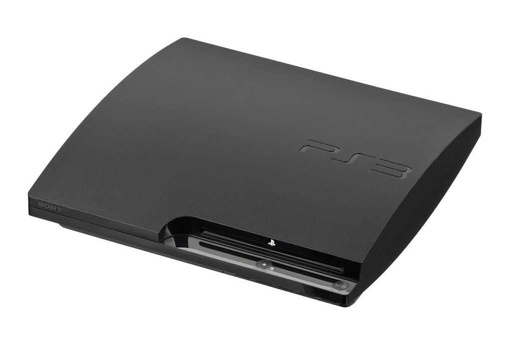 A black PS3 laid flat.