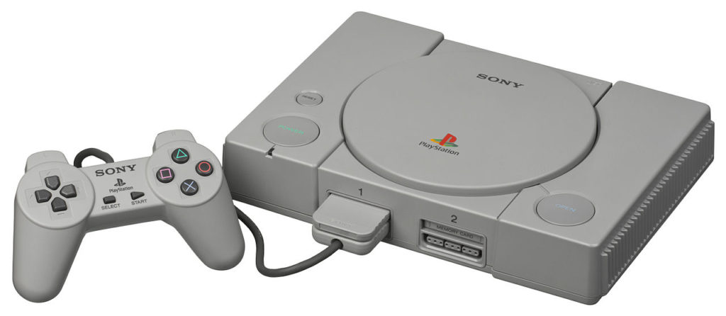 A gray PS1 laid flat.