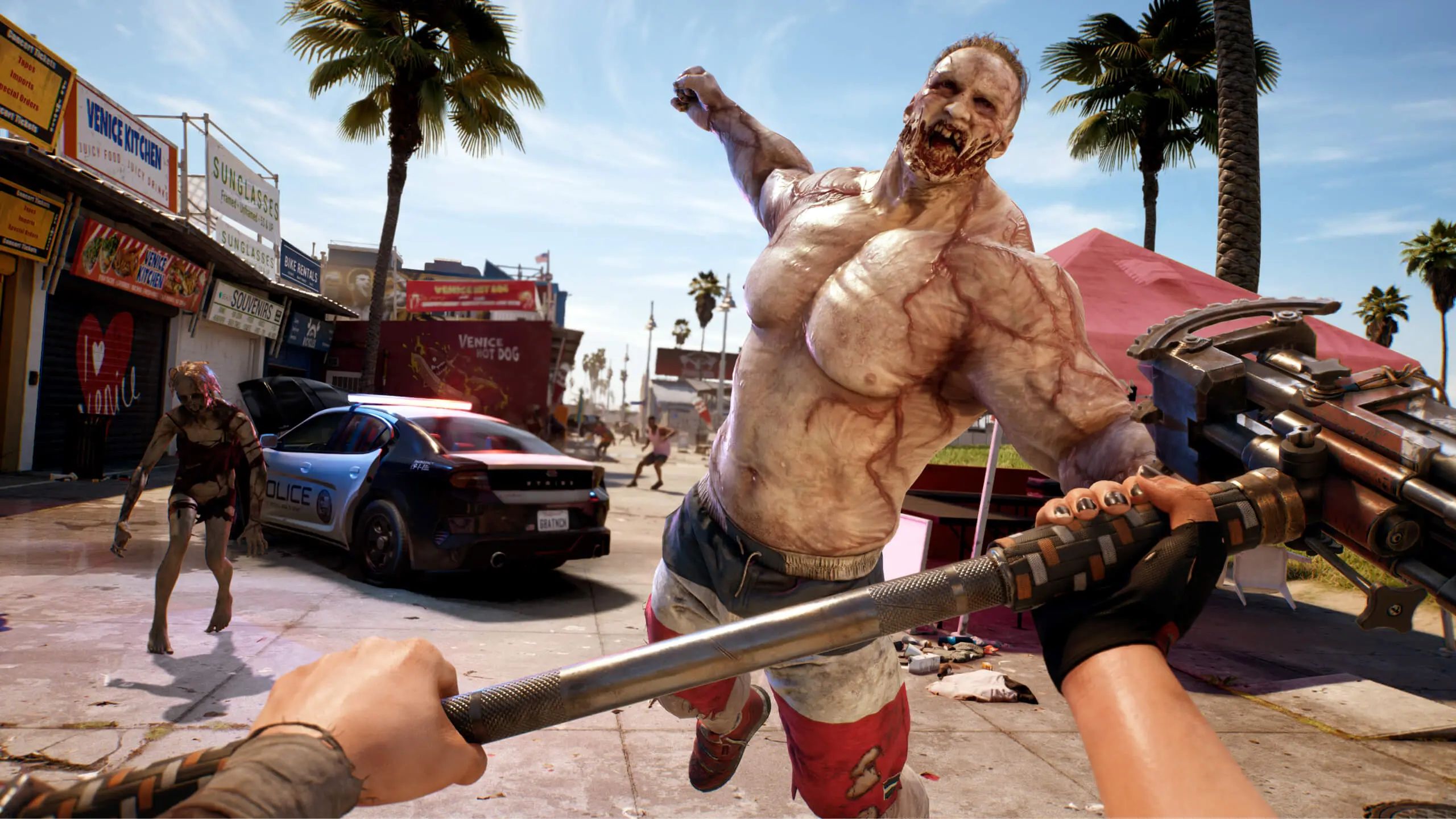 A screenshot from Dead Island 2 showing a muscular zombie about to punch the player, who holds up a iron pipe in defense