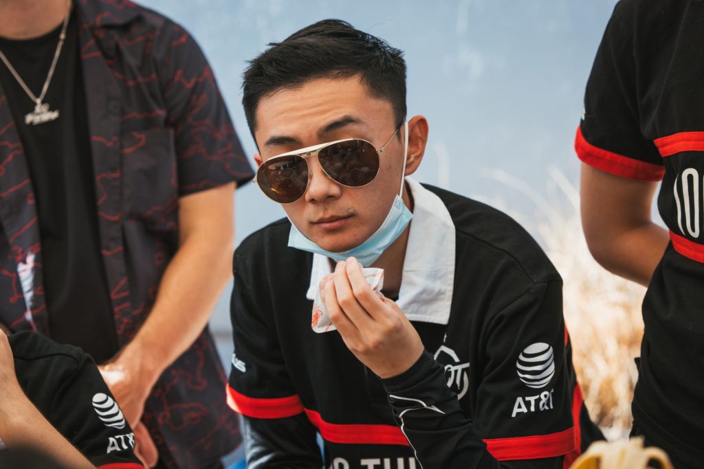 Victor "FBI" Huang stares at camera with dark glasses on.