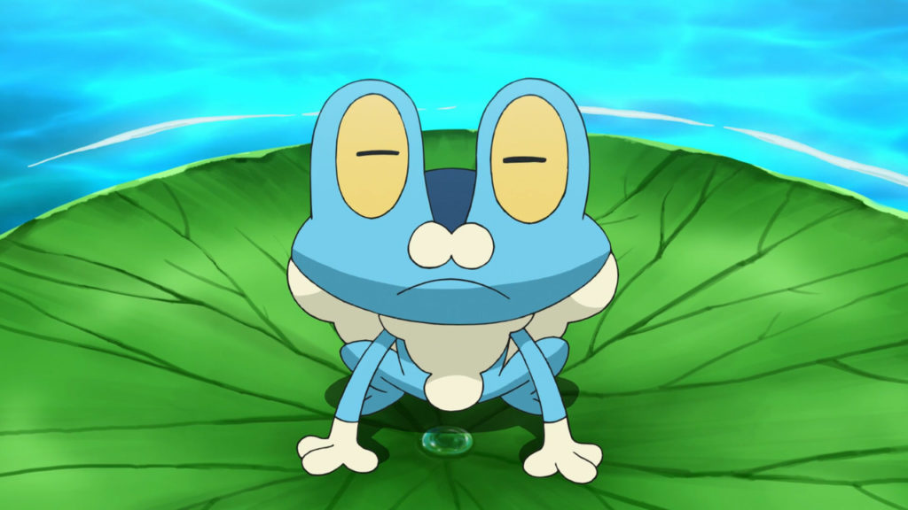 Froakie sits peacefully on a lilypad.