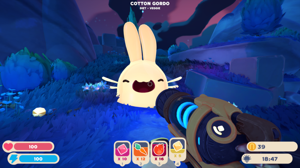A screengrab of Slime Rancher 2 showing a large yellow slime with bunny ears and whiskers